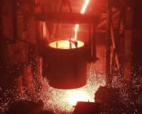 pouring molten metal into molds